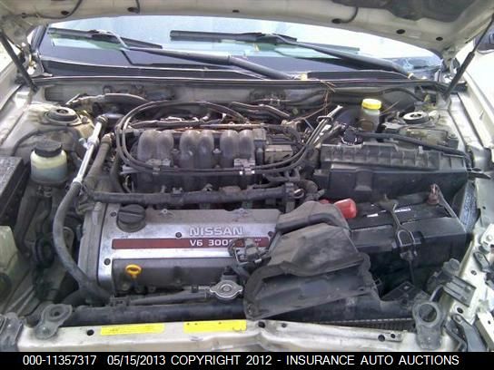 Used 2000 Infiniti I30 Engine Accessories I30 Coil Ignitor Part 4